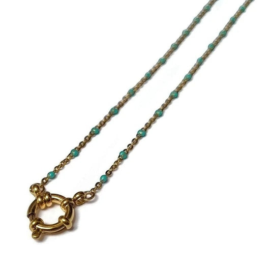 Aramat Jewels gold-tone stainless steel necklace with small green enamel beads and a circular clasp.