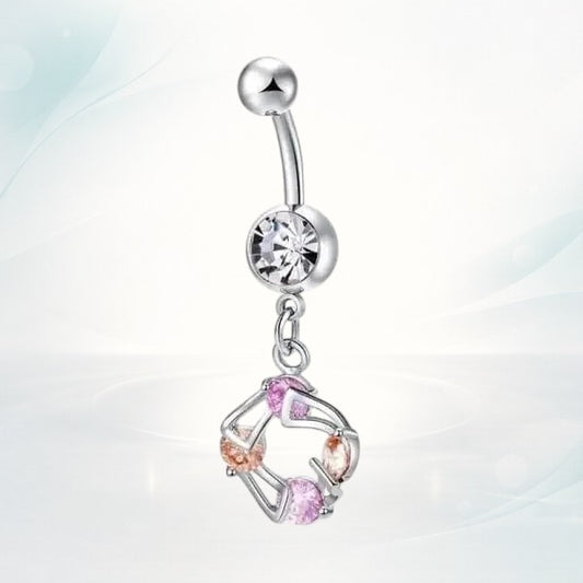 Aramat Jewels silver surgical steel navel piercing with a clear cz and a pink and champagne cz dangle.