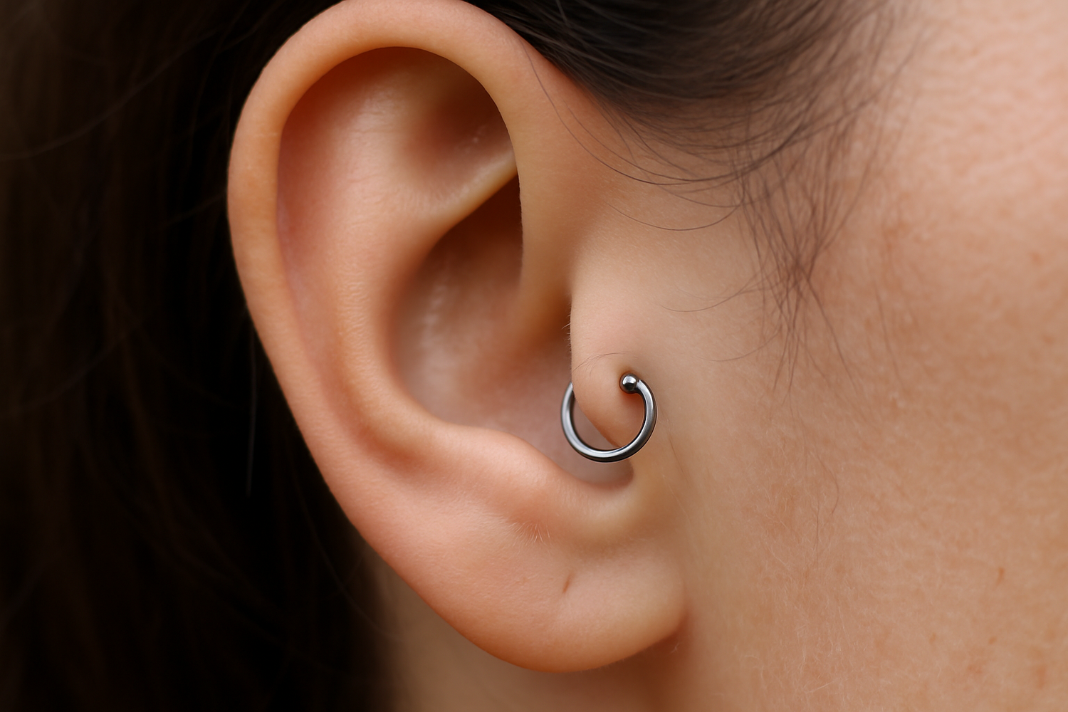 Tragus piercing staal
