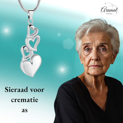 Pendentif quatre cœurs – bijou de deuil symbolique en acier