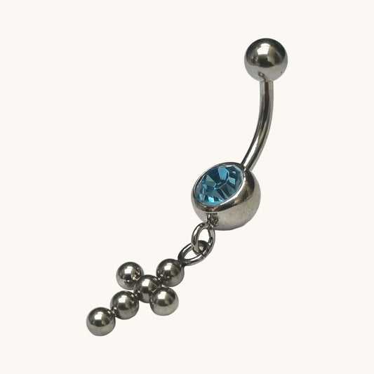 Lichtblauwe Zirkonia Navelpiercing met Kruisje