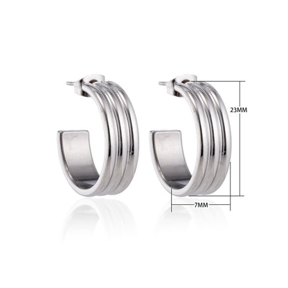 Boucles d'oreilles – Demi-anneaux rayés en relief de 23 mm sur acier inoxydable argenté 