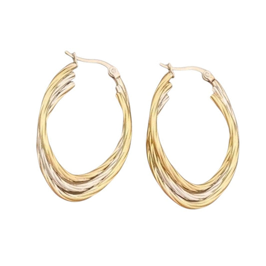 Aramat Jewels oval hoop earrings in gold and silver tones with a twisted design, 38x6mm.