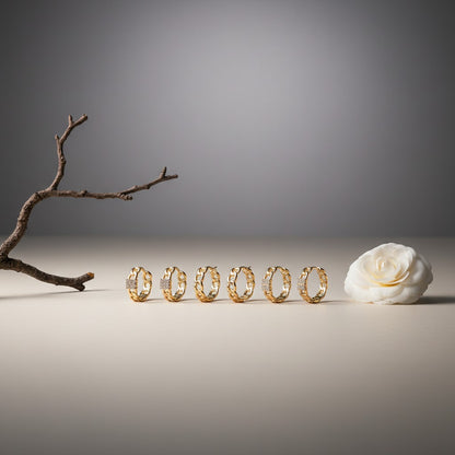 Aramat Jewels gold-plated 925 silver ear party set with chain-link huggies and cubic zirconia accents.