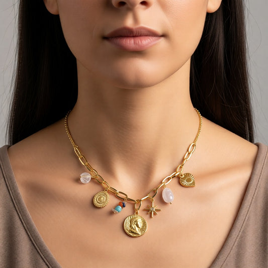 Aramat Jewels gold-tone stainless steel necklace with pearl, crystal, coin, heart, and star charms. Adjustable 45+5cm.