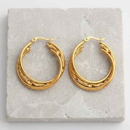 Aramat Jewels triple gold hoop earrings with a twisted textured detail, 30x7mm.