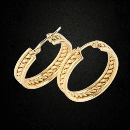 Aramat Jewels gold-tone stainless steel hoop earrings with a twisted rope design detail. Diameter 30mm.