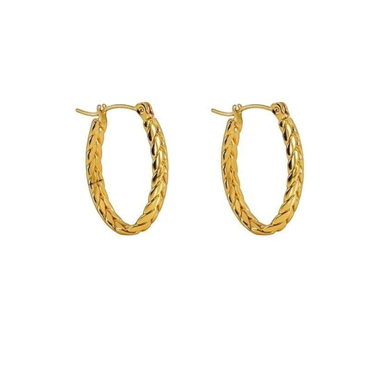 Aramat Jewels gold oval hoop earrings with a braided texture, 26x18mm, made of stainless steel.