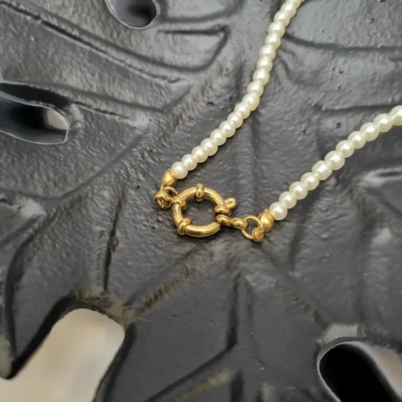 Aramat Jewels gold-tone clasp on a delicate white pearl bead necklace, 42cm length.