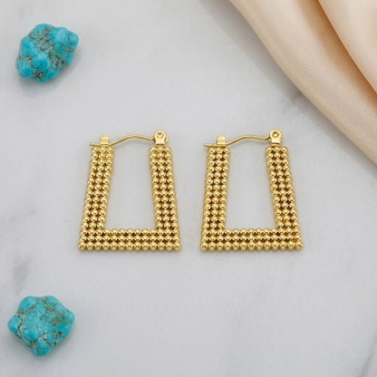 Aramat Jewels gold-tone stainless steel rectangular hoop earrings with a beaded texture, 28x20mm.