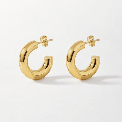Aramat Jewels massieve gouden halve oorringen van RVS, 25x8mm, gladde chunky hoepels.