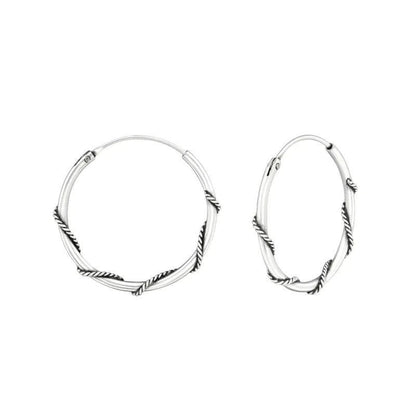 Aramat Jewels 20mm oxidised silver Bali hoop earrings with a twisted rope design. Ethnic boho style.