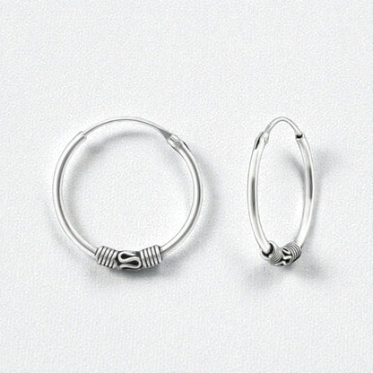 Aramat Jewels 18mm oxidized silver Bali hoop earrings with intricate detailing, perfect for festival or everyday wear.