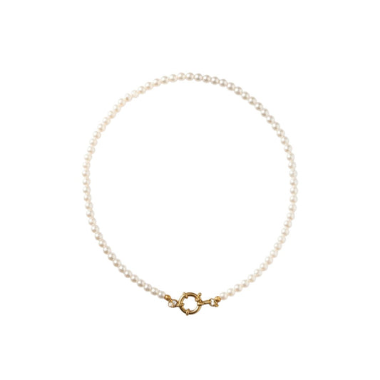 Aramat Jewels women's gold-tone necklace with small white pearls and a circular clasp.
