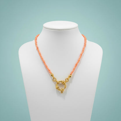 Aramat Jewels gold-tone necklace with salmon pink seed beads and a circular clasp, 42cm length.