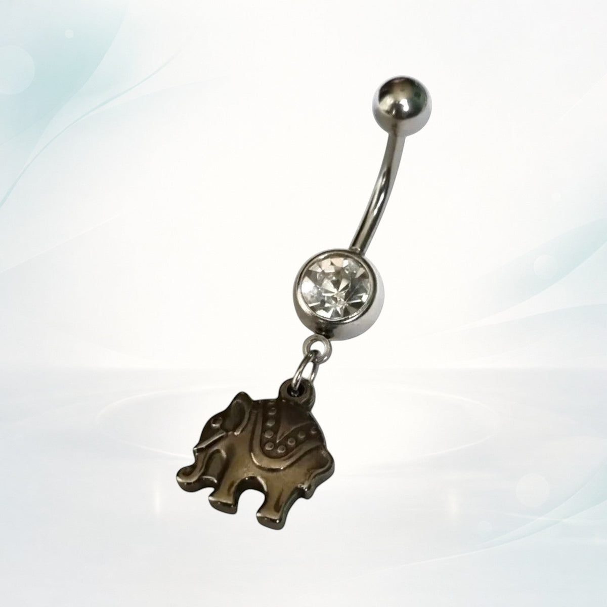 Aramat Jewels silver surgical steel belly button piercing with a detailed elephant charm and clear cubic zirconia.