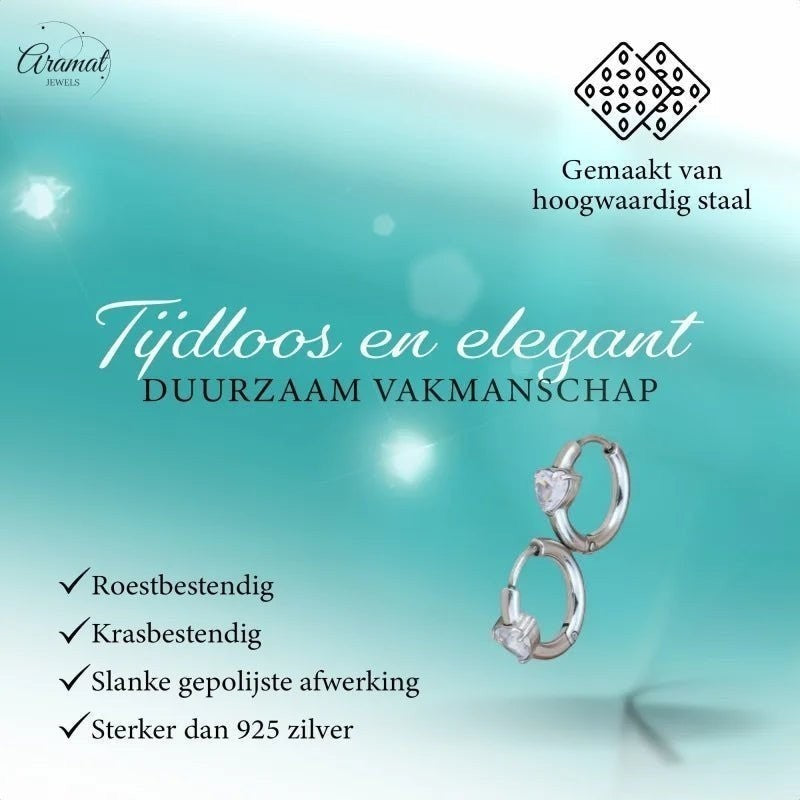 Aramat Jewels silver stainless steel hoop earrings with heart-shaped cubic zirconia.