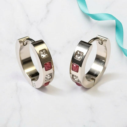 Aramat Jewels silver-tone stainless steel hoop earrings with pink and clear cubic zirconia stones, 17mm diameter.