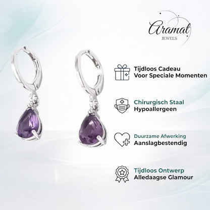 Aramat Jewels silver-tone huggie hoop earrings with dangling purple pear-cut cubic zirconia.