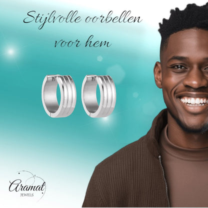 Aramat Jewels silver-tone stainless steel hoop earrings with three raised stripes, 20mm diameter, 7mm width.