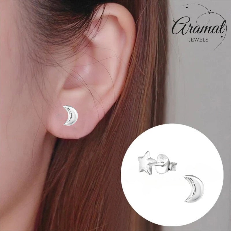 Aramat Jewels sterling silver star and crescent moon stud earrings, 6x5mm, high polish finish.