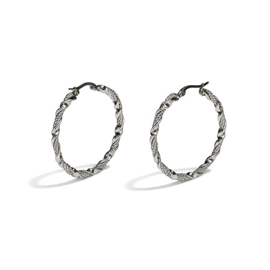 Aramat Jewels silver-tone stainless steel twisted hoop earrings, 30mm or 40mm diameter, 3mm width, with a shiny finish and hinge clasp.
