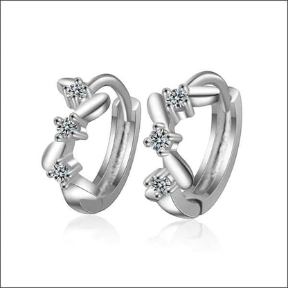 Aramat Jewels silver hoop earrings with zigzag pattern and clear cubic zirconia stones, 12mm.