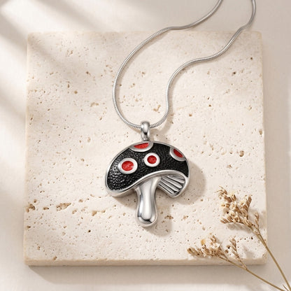 Aramat Jewels stalen paddenstoel ashanger met rode emaille stippen, zilverkleurig en zwart.