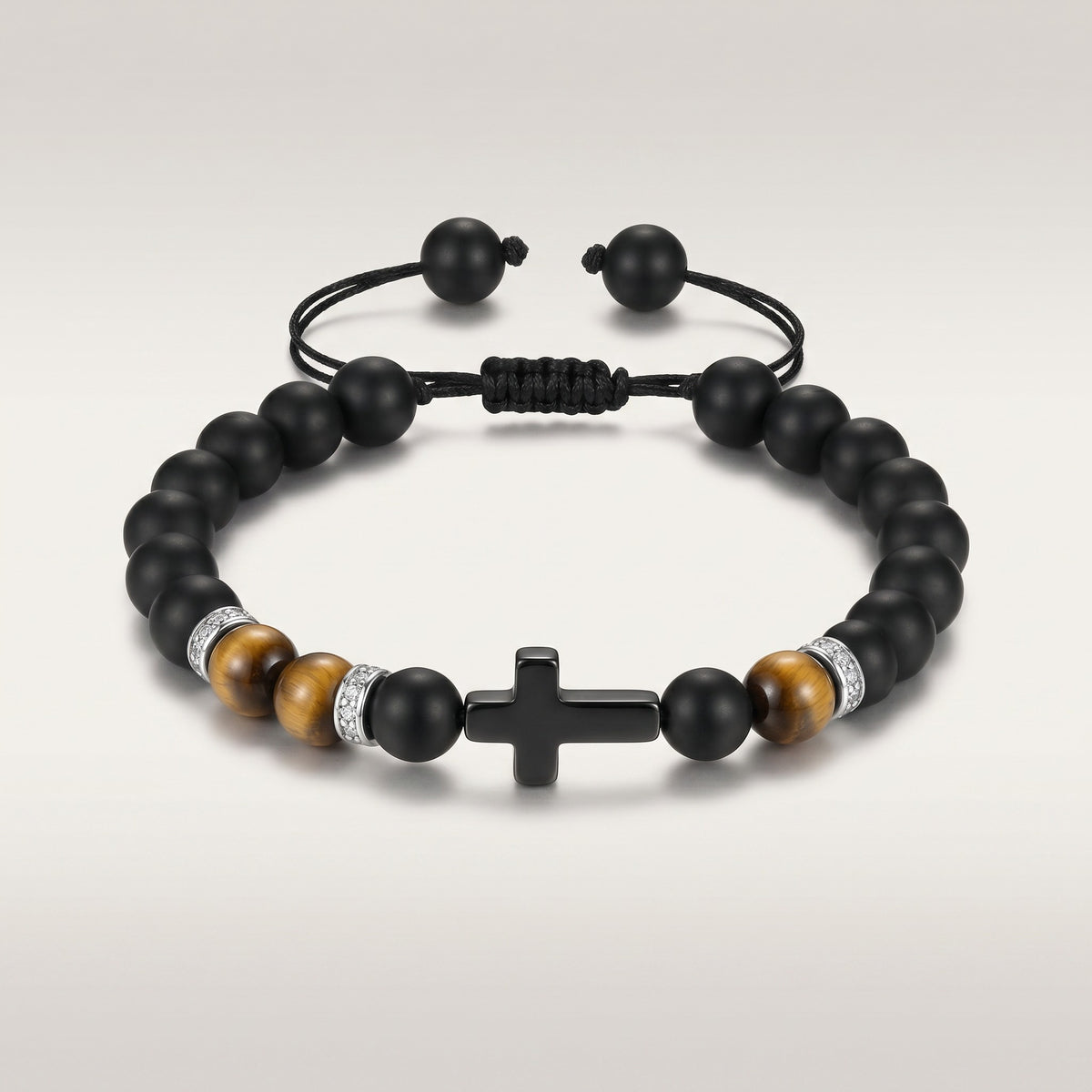 Aramat Jewels verstelbare armband met zwarte steen, tijgeroog en kruisje