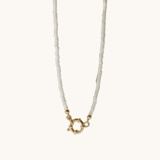 Aramat Jewels white Rocailles beaded necklace with gold clasp, 42cm length, handmade from stainless steel.