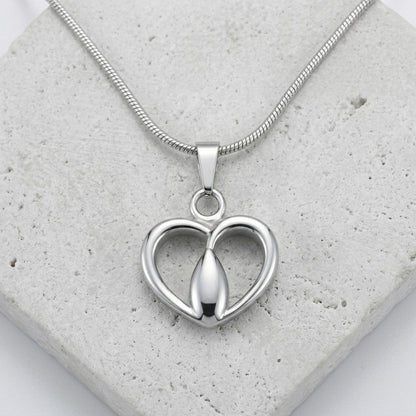 Aramat Jewels zilverkleurige stalen ashanger in hartvorm met een subtiel, tijdloos ontwerp.