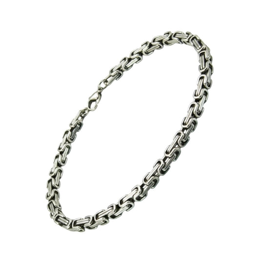 Zilverkleurige Aramat Jewels koningsschakel armband van 5mm breed RVS met een plat design.
