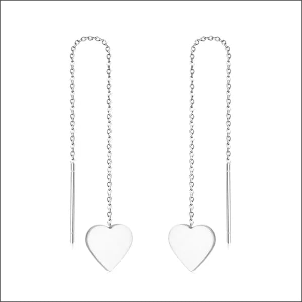 Hartvormige zilveren oorbellen met kettingdraad.