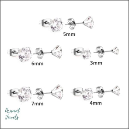 Een set van vier paar zilveren oorbellen