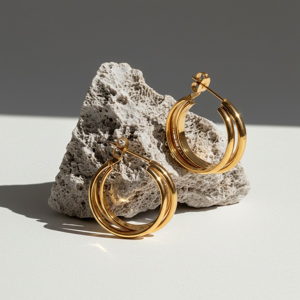 Goudkleurige 3 - Lijns Halve Oorringen 24x9,5mm Twist RVS - Aramat Jewels - Oorbellen - cadeautip