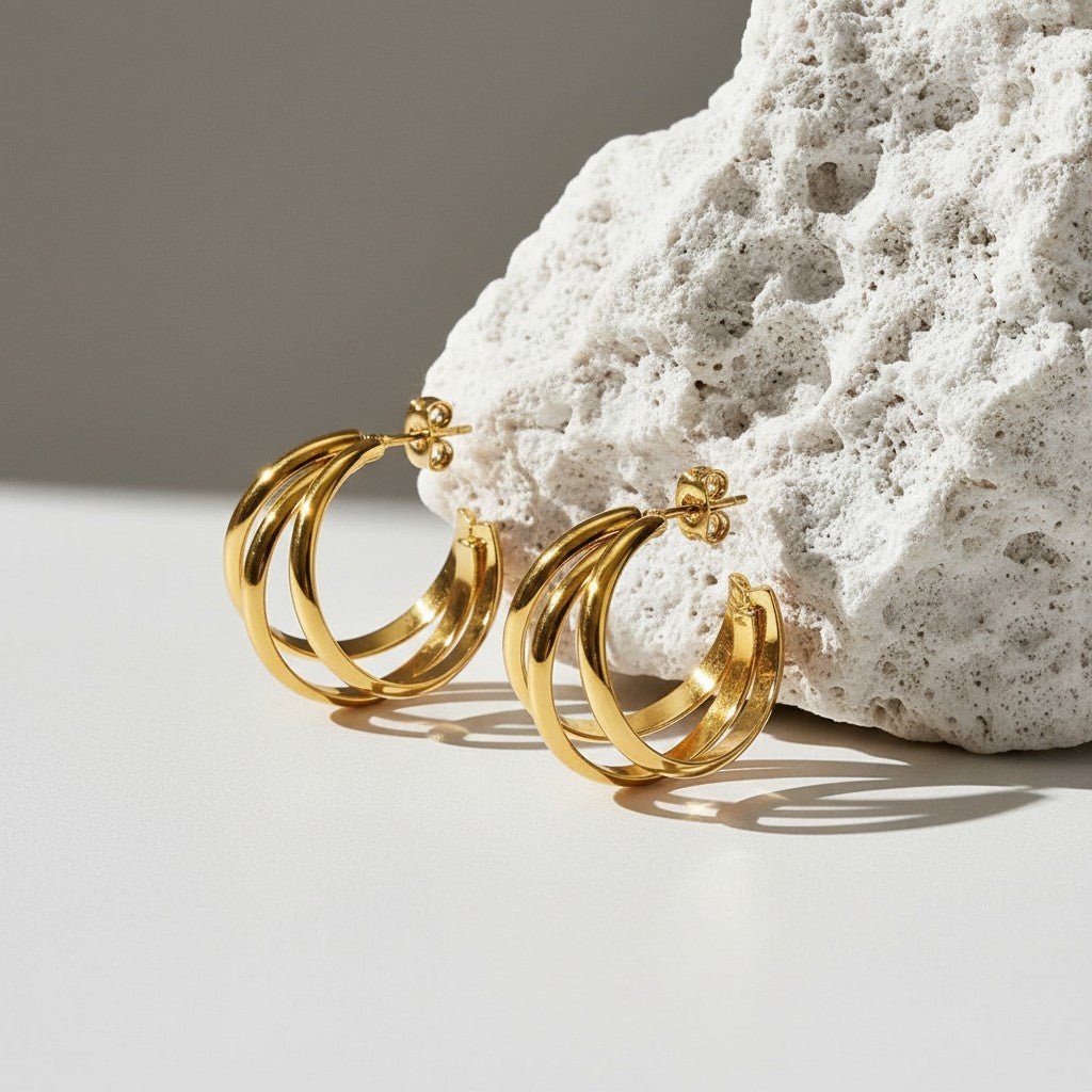 Goudkleurige 3 - Lijns Halve Oorringen 24x9,5mm Twist RVS - Aramat Jewels - Oorbellen - cadeautip