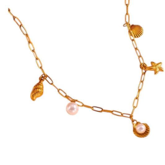 Goudkleurige damesketting met schelp - en parelbedels - ket1165 - 511143 - Halskettingen kopen# - 45cm - alles - Bedelketting