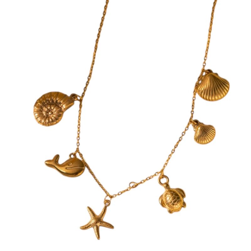 Goudkleurige damesketting met zee - bedels – 40+5 cm - ket1169 - 599158 - Halskettingen kopen# - 40cm - alles - Bedelketting