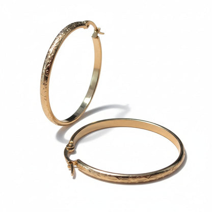 Goudkleurige RVS Hoepeloorbellen met Bloemmotief - 40 mm - Aramat Jewels - Oorringen - cadeautip