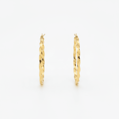 Goudkleurige RVS Swirl Hoepeloorbellen - 35 mm - Aramat Jewels - Oorbellen - cadeautip