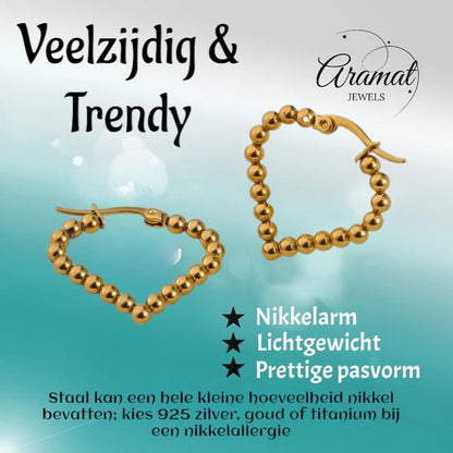 Goudkleurige stainless steel druppelvormige oorringen met bolletjesmotief – 33 mm - oor6410 - 514399 - Oorringen kopen# - 33mm - alles - bolletjes