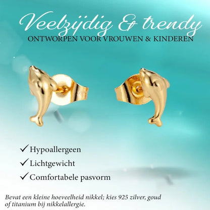 Gouden oorbellen met dolfijn.