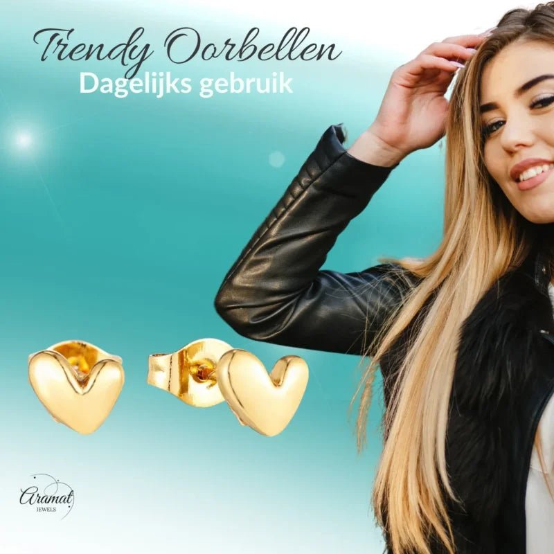 Gouden hartvormige oorbellen.