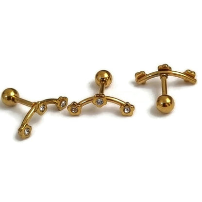 Paar manchetknopen in goudkleur met diamanten aan beide zijden