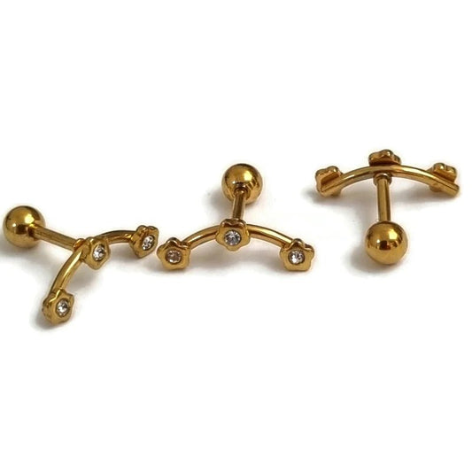 Paar manchetknopen in goudkleur met diamanten aan beide zijden