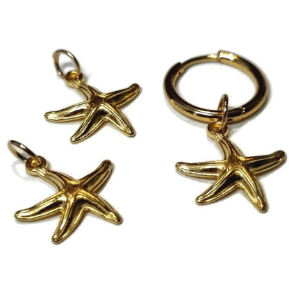 Een paar gouden zeester bedels