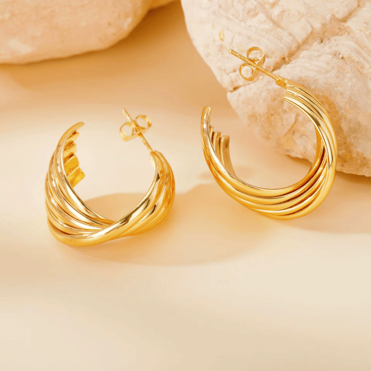 RVS Goudkleurige Halve Oorringen 22x15mm - 5 Lijnen Twist - Aramat Jewels - RVS Sieraden - Oorbellen - cadeautip