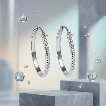 RVS Oorringen met Puntjes Motief Zilverkleur 30mm - Aramat Jewels - Oorringen - cadeautip