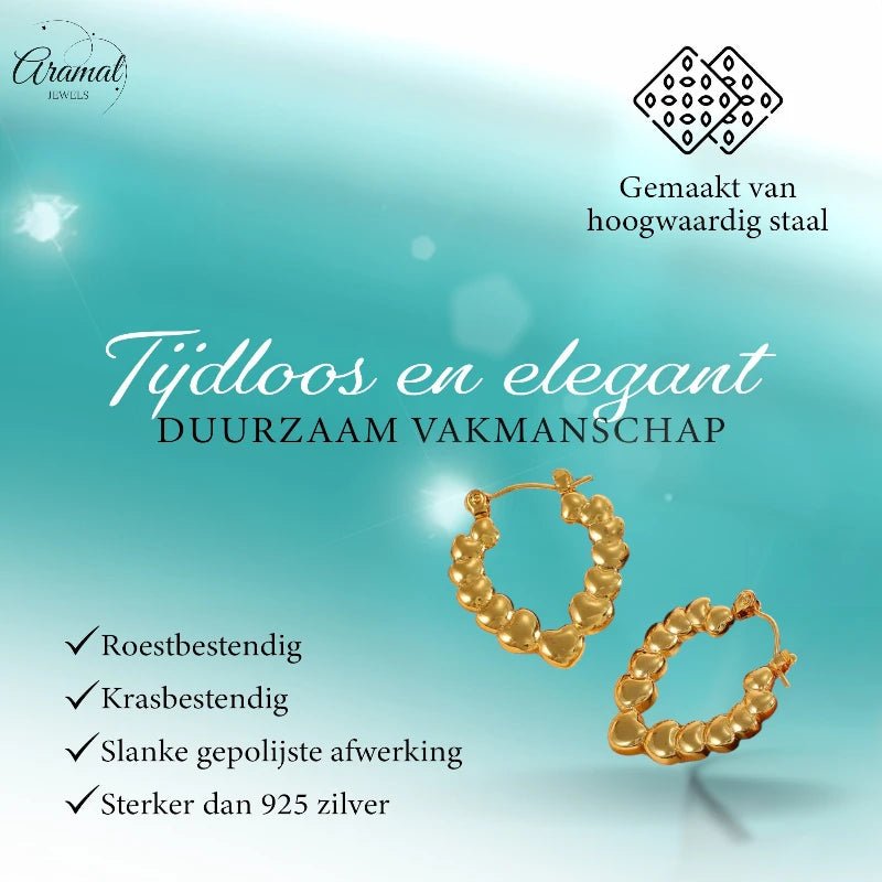 Stainless steel druppelvormige oorringen met hartjesmotief - oor6405 - 792418 - Oorringen kopen# - 26mm - alles - cadeau