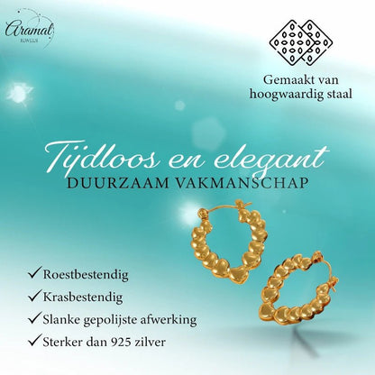 Stainless steel druppelvormige oorringen met hartjesmotief - oor6405 - 792418 - Oorringen kopen# - 26mm - alles - cadeau